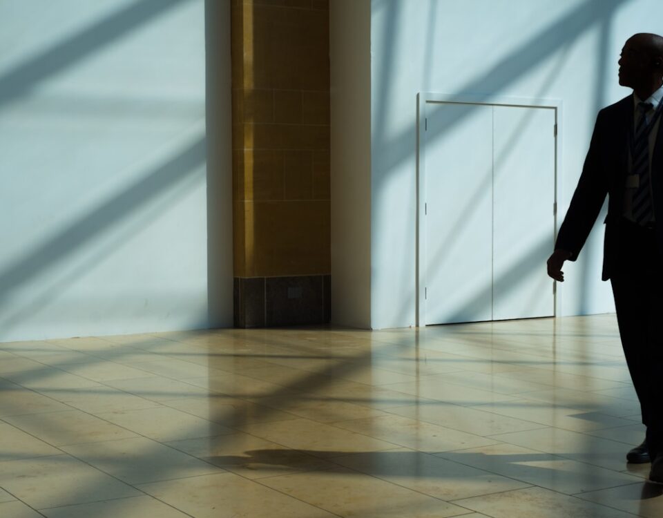man walking on hallway